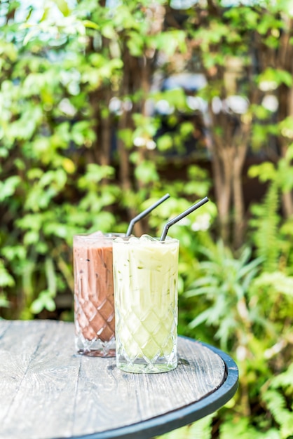 iced matcha green tea and chocolate glass on the table