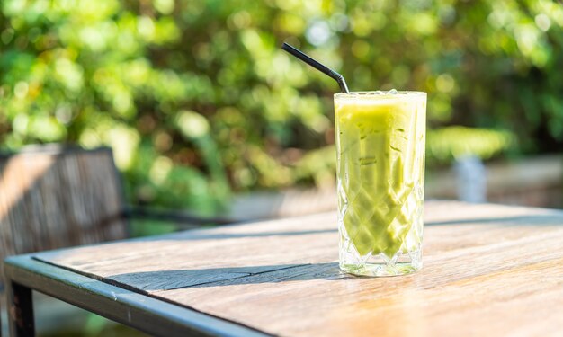 iced matcha green tea glass on the table