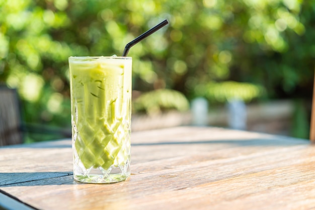 iced matcha green tea glass on the table