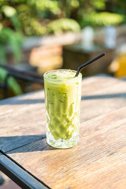 iced matcha green tea glass on the table