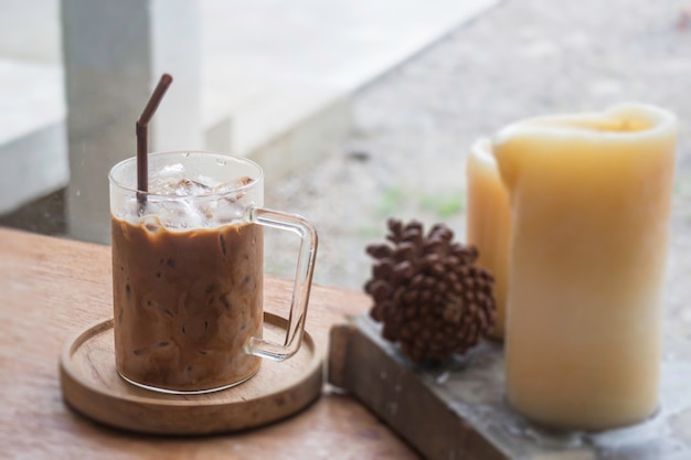 Iced milk mocha on wooden table