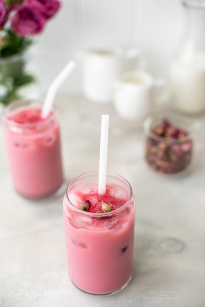 Iced pink matcha with ice in a glasses