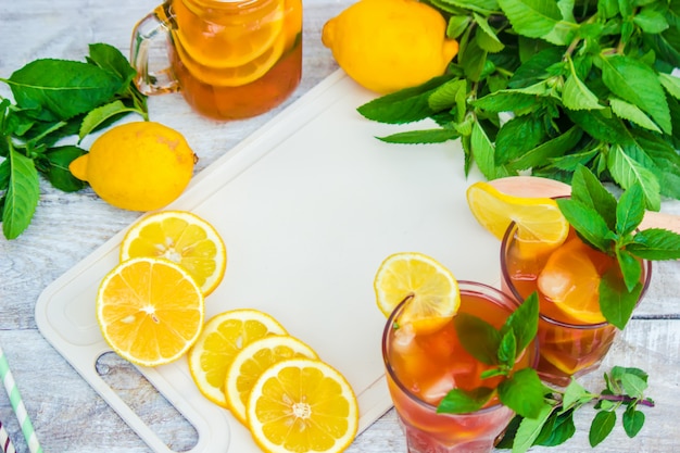 Iced tea, lemon and mint. Selective focus.