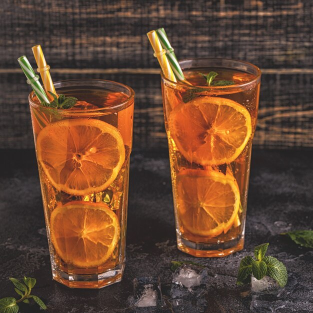 Iced tea with lemon slices and mint 