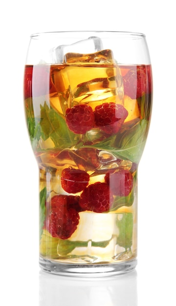 Iced tea with raspberries and mint isolated on white