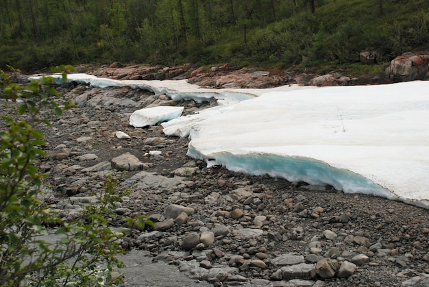 The icefield in the tideway of the mountain river