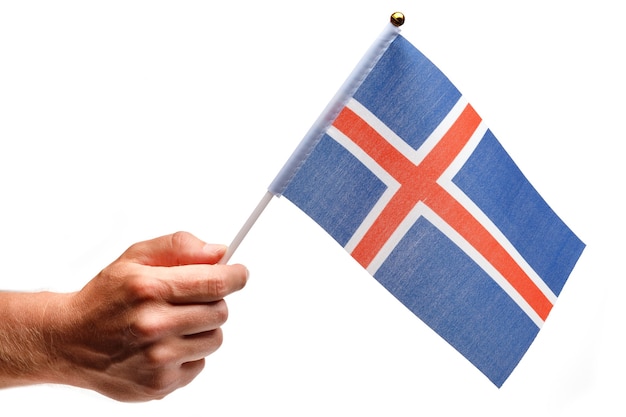 Iceland flag small in hand isolate.