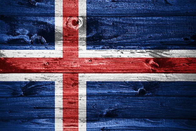 Iceland flag on wooden planks background wood flag