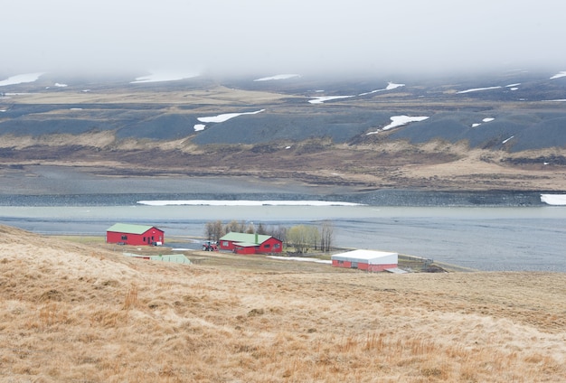 Iceland village city in mountains on field