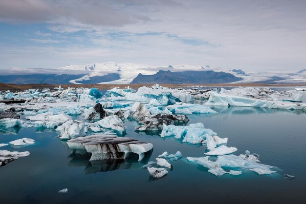 Icelandic glacial scenery iceberg floating in the calm water