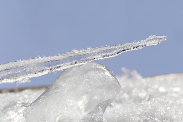 An icicle on a block of ice