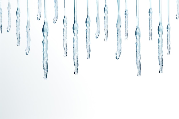 Photo icicles border on white background with empty copy space