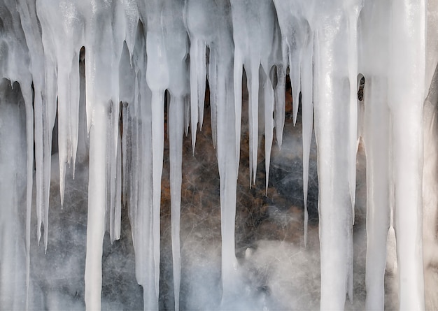 Icicles ice wall on Baikal lake at winter