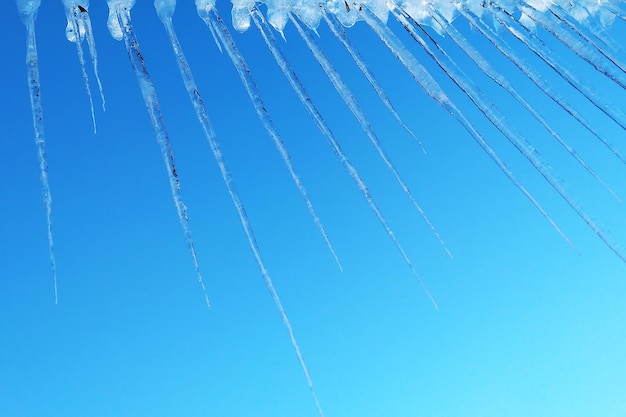 Icicles on the roof drops of spring