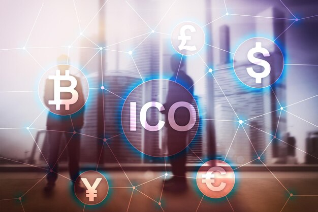 ICO Initial coin offering Blockchain and cryptocurrency concept on blurred business building background