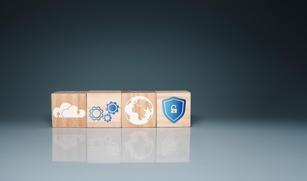 Photo icon on a wooden cube represents data theft protection security in business teams