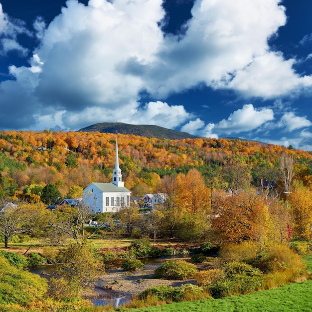 Iconic New England church in Stowe town at autumn