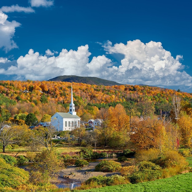 Iconic New England church in Stowe town at autumn