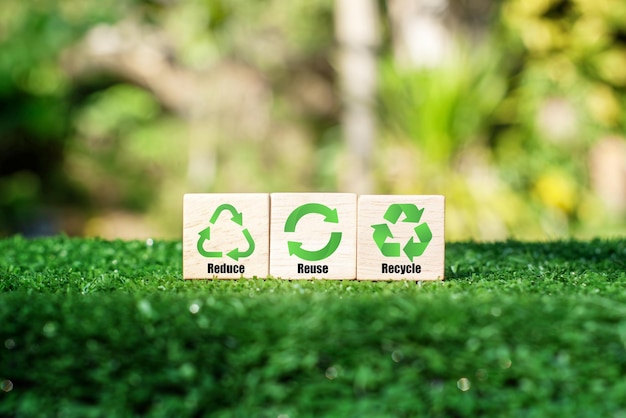 icons related to reduce reuse recycle on green background blocks The concept of reduce reuse reu