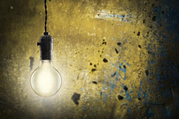 Idea concept bulb on the grunge background