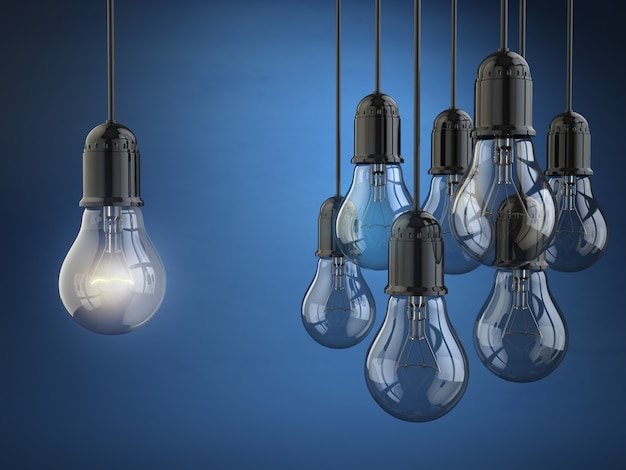 Idea or leadership concept. Group of light bulbs on the blue background. 3d