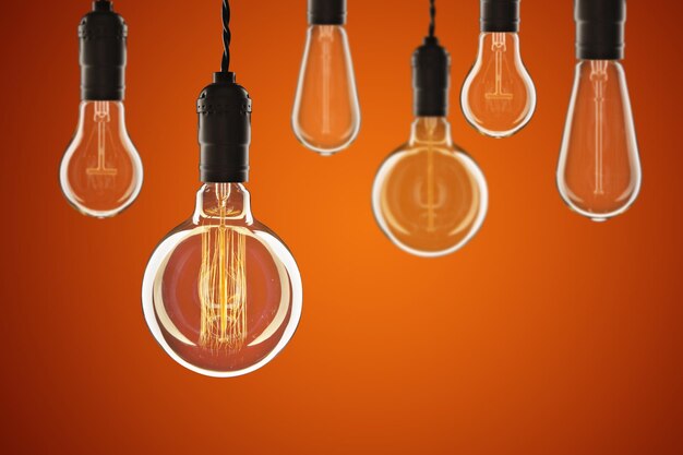 Idea and leadership concept Vintage incandescent Edison bulbs on