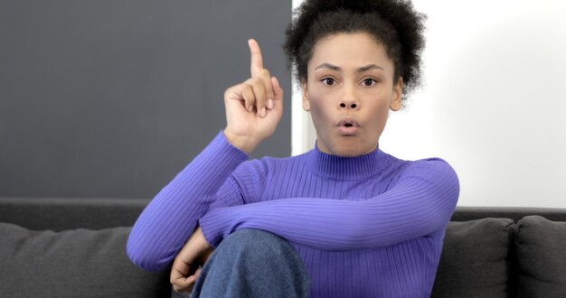 Photo idea portrait of impressed african american woman