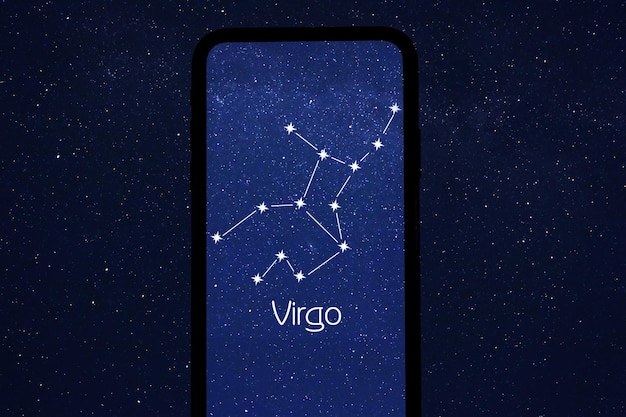 Identified by stargazing app stick figure pattern of Virgo constellation on phone screen on at night closeup