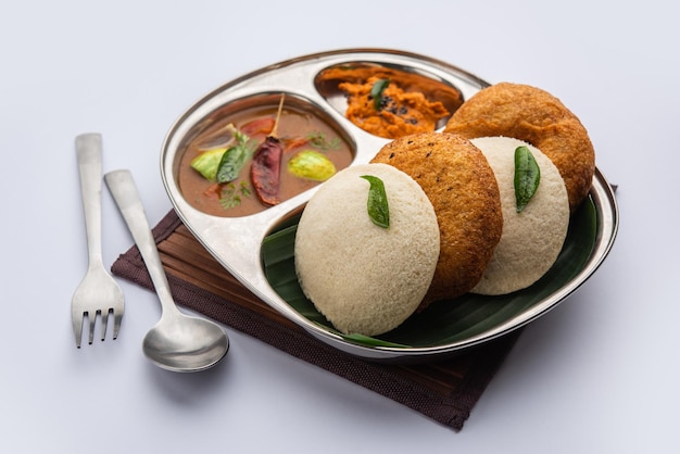 Idli vada with sambar pr sambhar also called medu wada rice cake