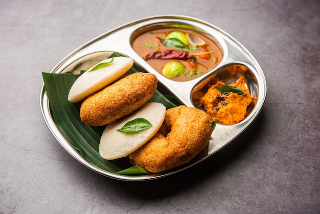 Idli vada with sambar pr sambhar also called medu wada rice cake