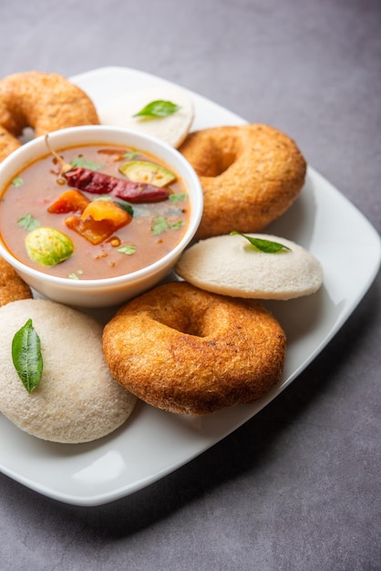 Idli vada with sambar pr sambhar also called medu wada rice cake