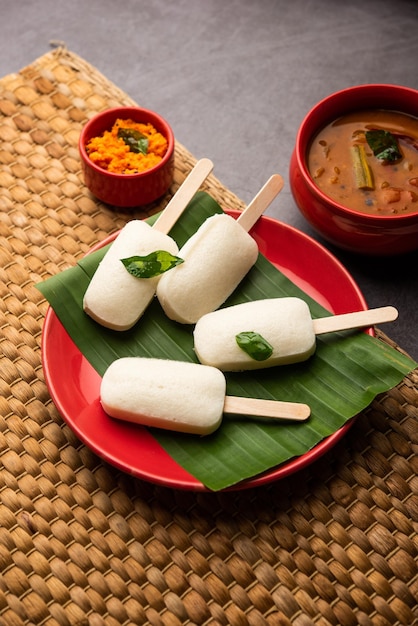 Idly lollipop or idli candy with stick served with sambar and chutneySouth indian breakfast