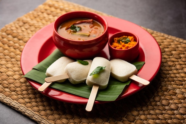 Idly lollipop or idli candy with stick served with sambar and chutneySouth indian breakfast