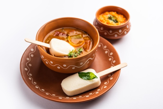 Idly lollipop or idli candy with stick served with sambar and chutneySouth indian breakfast