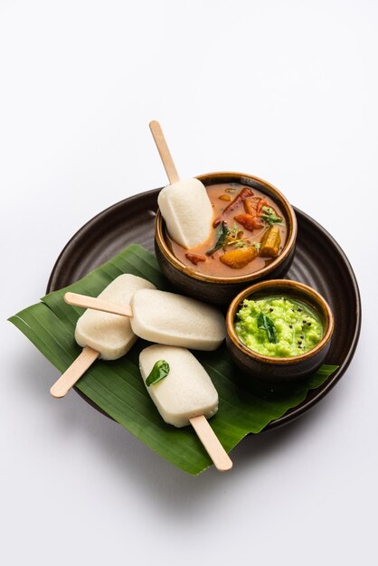 Idly lollipop or idli candy with stick served with sambar and chutneySouth indian breakfast