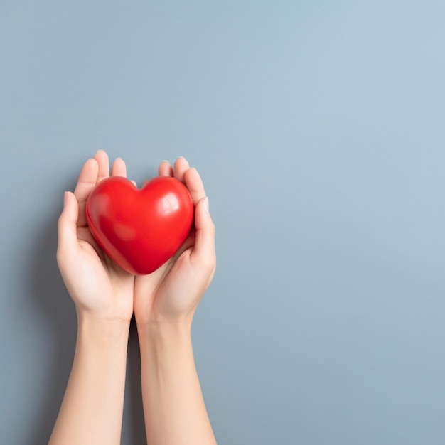 Iemand die een rood hart in zijn handen houdt tegen een blauwe achtergrond generatieve ai