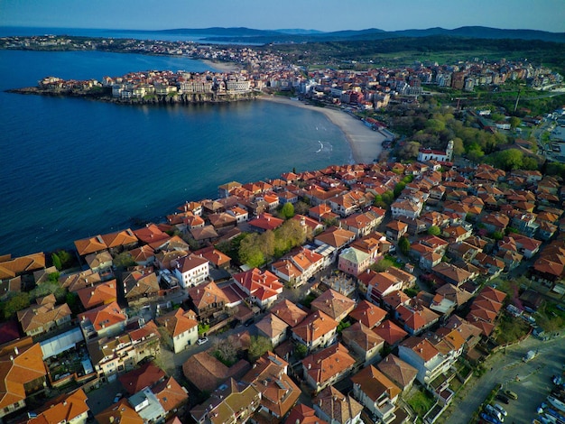 Iew from a height of the city of Nessebar with houses and parks washed by the Black Sea in Bulgaria