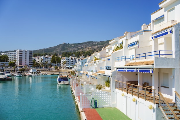 iew of "Les Fonts Marina" on a sunny day. Port in the Mediterranean Spanish coast.
