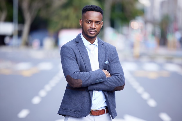 If youre going through hell keep going. Shot of a confident young businessman out in the city.