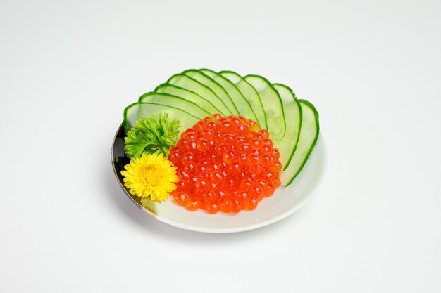 Ikura or Salmon egg with cucumber japanese cuisine