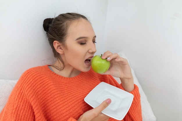 During illness the teenager decided to eat a green apple full of vitamin C