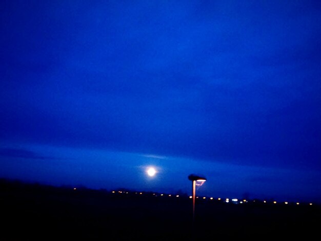 Illuminated blue sky at night