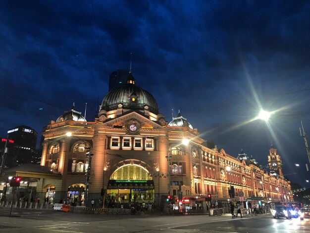 Illuminated buildings in city at night