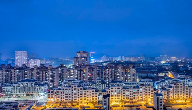 Illuminated buildings in city at night