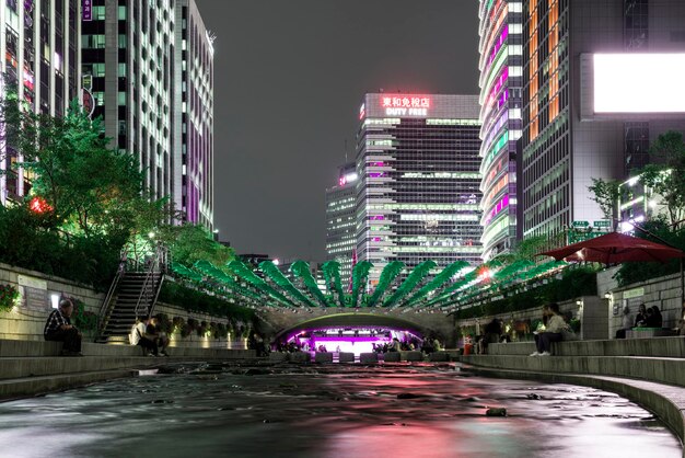 Illuminated buildings in city at night