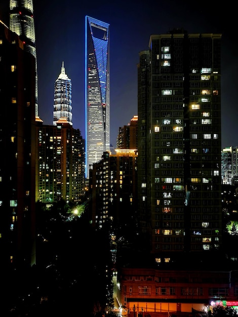 Illuminated buildings in city at night