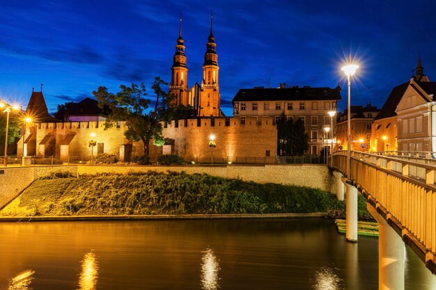 Illuminated buildings in city at night