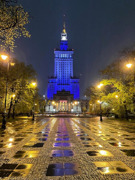 Illuminated buildings in city at night