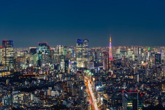 Photo illuminated buildings in city