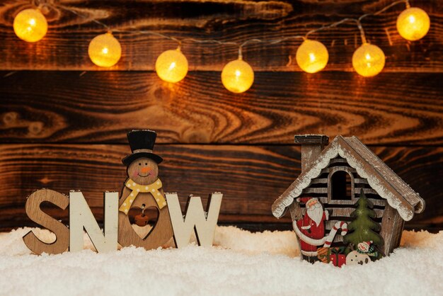 Photo illuminated christmas lights on snow